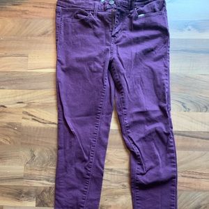 Maroon Levi legging. W 28